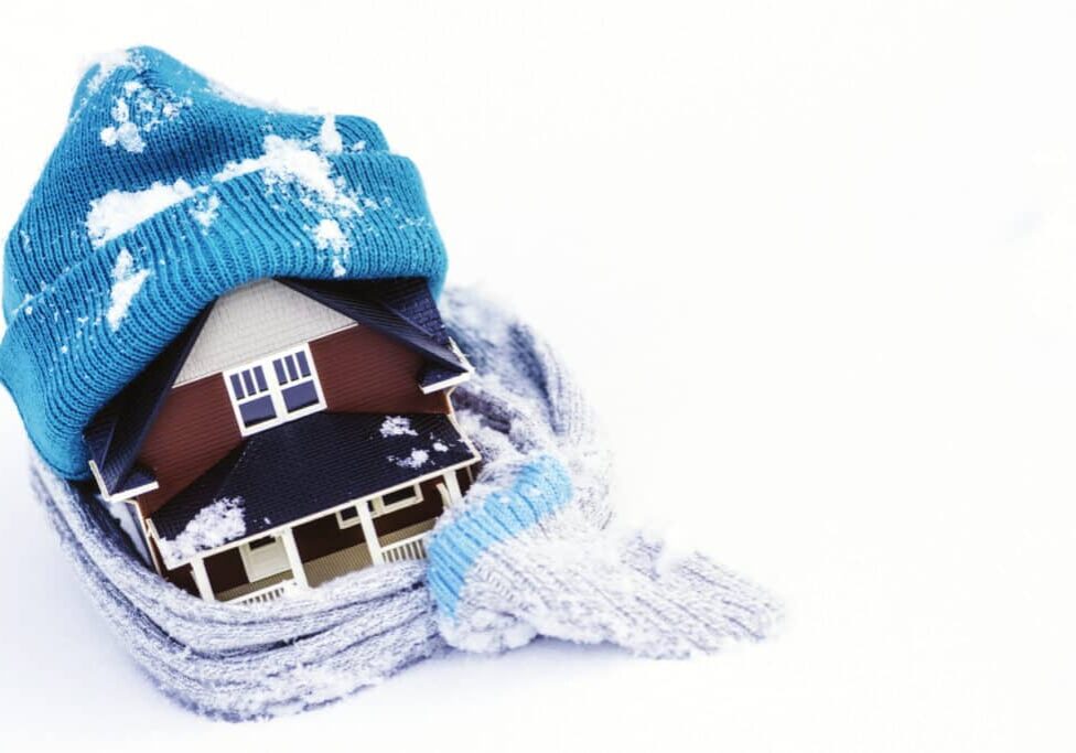 House Wrapped in Winter Clothing; Insulate Your Home