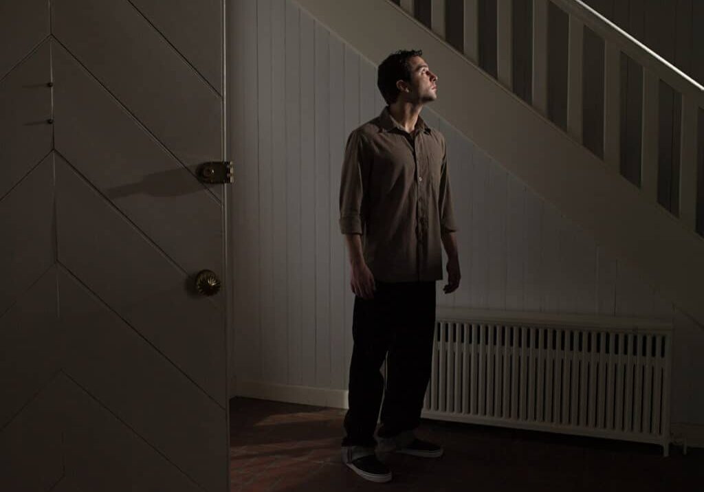 Man in hallway Man in hallway