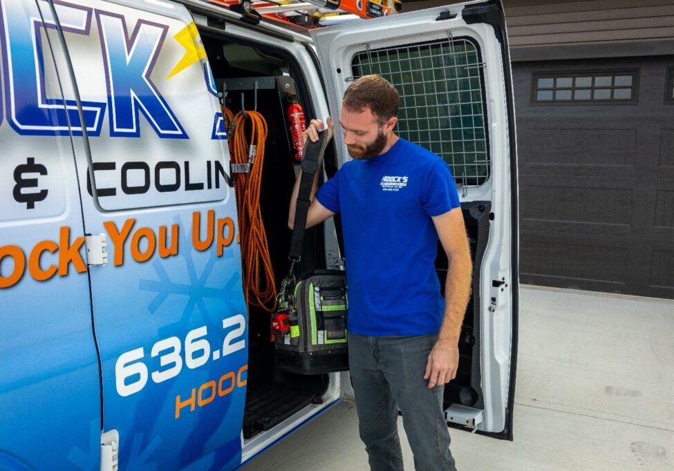 Hoock’s Heating & Cooling HVAC technician arriving for AC maintenance for a Wentzville, MO homeowner.